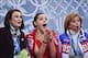 Feb 19, 2014; Sochi, RUSSIA; Adelina Sotnikova of Russia and her coaches wait for her scores for her performance in the ladies short program during the Sochi 2014 Olympic Winter Games at Iceberg Skating Palace. Mandatory Credit: Robert Deutsch-USA TODAY