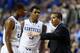 LEXINGTON, KY - NOVEMBER 25: John Calipari the head coach of the Kentucky Wildcats talks with Aaron Harrison #2 and Andrew Harrison #5 during the game against the Cleveland State Vikings at Rupp Arena on November 25, 2013 in Lexington, Kentucky. (Photo