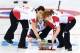 SOCHI, RUSSIA - FEBRUARY 19: Jennifer Jones of Canada releases the stone during the women's semifinal match between Great Britain and Canada at Ice Cube Curling Center on February 19, 2014 in Sochi, Russia. (Photo by Paul Gilham/Getty Images)