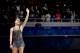 SOCHI, RUSSIA - FEBRUARY 20: Gold medalist Adelina Sotnikova of Russia celebrates on the podium during the flower ceremony for the Ladies' Figure Skating on day 13 of the Sochi 2014 Winter Olympics at Iceberg Skating Palace on February 20, 2014 in Sochi,