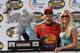 DOVER, DE - JUNE 04: Martin Truex Jr., driver of the #1 Bass Pro Shops/Tracker Chevrolet, stands with his girlfriend Sherry Pollex, in victory lane after winning the NASCAR Nextel Cup Series Autism Speaks 400 on June 4, 2007 at Dover Downs International