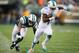 EAST RUTHERFORD, NJ - DECEMBER 01: Mike Wallace #11 of the Miami Dolphins scores a touchdown on the missed tackle by Dee Milliner #27 of the New York Jets in the fourth quarter during their game at MetLife Stadium on December 1, 2013 in East Rutherford,