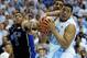 CHAPEL HILL, NC - FEBRUARY 20: Jabari Parker #1 of the Duke Blue Devils battles James Michael McAdoo #43 and Kennedy Meeks #3 of the North Carolina Tar Heels for a rebound during their game at the Dean Smith Center on February 20, 2014 in Chapel Hill, No