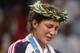 ATHENS - AUGUST 23: (L-R) An emotional Sara McMann of the USA winner of the Silver medal stands on the podium after the women's Freestyle wrestling 63 kg event on August 23, 2004 during the Athens 2004 Summer Olympic Games at Ano Liossia Olympic Hall in