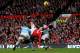 MANCHESTER, ENGLAND - FEBRUARY 12: Wayne Rooney of Manchester United scores a goal from an overhead kick during the Barclays Premier League match between Manchester United and Manchester City at Old Trafford on February 12, 2011 in Manchester, England.