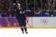 SOCHI, RUSSIA - FEBRUARY 15: T.J. Oshie #74 of the United States celebrates after scoring on a shootout against Sergei Bobrovski #72 of Russia to win the Men's Ice Hockey Preliminary Round Group A game on day eight of the Sochi 2014 Winter Olympics at Bo