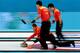 SOCHI, RUSSIA - FEBRUARY 21: Liu Rui of China competes during the Bronze medal game between China and Sweden at the Ice Cube Curling Center on February 21, 2014 in Sochi, Russia. (Photo by Streeter Lecka/Getty Images)