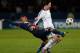 PARIS, FRANCE - NOVEMBER 05: Marco Verratti of PSG (L) tackles Sacha Kljestan of Anderlect during the UEFA Champions League Group C match between Paris Saint Germain and RSC Anderlecht at Parc des Princes on November 5, 2013 in Paris, France. (Photo by H