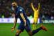 PARIS, FRANCE - NOVEMBER 19: Karim Benzema of France celebrates scoring during the FIFA 2014 World Cup Qualifier Play-off second leg match between France and Ukraine at the Stade de France on November 19, 2013 in Paris, France. (Photo by Bryn Lennon/Get