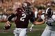 COLLEGE STATION, TX - NOVEMBER 09: Johnny Manziel #2 of the Texas A&M Aggies fights off the tackle of Preston Smith #91 of the Mississippi State Bulldogs at Kyle Field on November 9, 2013 in College Station, Texas. (Photo by Scott Halleran/Getty Images)