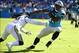 Oct 20, 2013; Charlotte, NC, USA; Carolina Panthers wide receiver Steve Smith (89) scores a touchdown in the third quarter past St. Louis Rams cornerback Janoris Jenkins (21) defends at Bank of America Stadium. Mandatory Credit: Bob Donnan-USA TODAY Sport