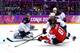 SOCHI, RUSSIA - FEBRUARY 21: Sidney Crosby #87 of Canada attempts to score against Brooks Orpik #44 and Jonathan Quick #32 of the United States during the Men's Ice Hockey Semifinal Playoff on Day 14 of the 2014 Sochi Winter Olympics at Bolshoy Ice Dome