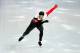 SOCHI, RUSSIA - FEBRUARY 10: Gilmore Junio of Canada competes during the Men's 500 m Race 2 of 2 Speed Skating event during day 3 of the Sochi 2014 Winter Olympics at Adler Arena Skating Center on February 10, 2014 in Sochi, Russia. (Photo by Quinn Roon