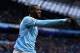 MANCHESTER, ENGLAND - FEBRUARY 22: Yaya Toure of Manchester City celebrates scoring the opening goal during the Barclays Premier League match between Manchester City and Stoke City at the Etihad Stadium on February 22, 2014 in Manchester, England. (Phot