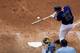 DENVER, CO - AUGUST 29: Tyler Colvin #21 of the Colorado Rockies hits an RBI single during the seventh inning against the Los Angeles Dodgers at Coors Field on August 29, 2012 in Denver, Colorado. The Dodgers defeated the Rockies 10-8 to avoid the three