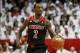 Feb 22, 2014; Cincinnati, OH, USA; Louisville Cardinals guard Russ Smith (2) brings the ball down court in the second half against the Cincinnati Bearcats at FifthThird Arena. Louisville defeated Cincinnati 58-57. Mandatory Credit: Frank Victores-USA TOD
