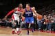 WASHINGTON, DC - JANUARY 20: Michael Carter-Williams #1 of the Philadelphia 76ers drives against John Wall #2 of the Washington Wizards during the game at the Verizon Center on January 20, 2014 in Washington, DC. NOTE TO USER: User expressly acknowledges
