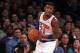 Jan 9, 2014; New York, NY, USA; New York Knicks shooting guard Iman Shumpert (21) controls the ball against the Miami Heat during the third quarter of a game at Madison Square Garden. Mandatory Credit: Brad Penner-USA TODAY Sports