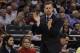 Feb 12, 2014; Orlando, FL, USA; Memphis Grizzlies head coach David Joerger claps against the Orlando Magic during the second quarter at Amway Center. Mandatory Credit: Kim Klement-USA TODAY Sports