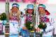 Feb 22, 2014; Krasnaya Polyana, RUSSIA; Marit Bjoergen (NOR, center) wins gold, Therese Johaug (NOR, left) wins silver, and Kristin Stoermer Steira (NOR, right) wins bronze in ladies' cross country skiing 30km mass start free during the Sochi 2014 Olympic
