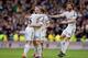 MADRID, SPAIN - FEBRUARY 22: Asier Illarramendi (2ndR) of Real Madrid CF celebrates scoring their opening goal with teammates Daniel Carvajal (L) and Xabi Alonso (R) during the La Liga match between Real Madrid CF and Elche CF at Estadio Santiago Bernabe