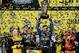 HOMESTEAD, FL - NOVEMBER 17: Jimmie Johnson, driver of the #48 Lowe's/Kobalt Tools Chevrolet, celebrates with champagne in Champions Victory Lane after winning the series championship following the NASCAR Sprint Cup Series Ford EcoBoost 400 at Homestead-