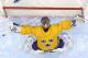 SOCHI, RUSSIA - FEBRUARY 21: Henrik Lundqvist #30 of Sweden celebrates after defeating Finland 2-1 during the Men's Ice Hockey Semifinal Playoff on Day 14 of the 2014 Sochi Winter Olympics at Bolshoy Ice Dome on February 21, 2014 in Sochi, Russia. (Phot