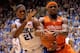DURHAM, NC - FEBRUARY 22: Amile Jefferson #21 of the Duke Blue Devils battle for the ball with C.J. Fair #5 of the Syracuse Orange during their game at Cameron Indoor Stadium on February 22, 2014 in Durham, North Carolina. (Photo by Grant Halverson/Gett