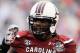 ORLANDO, FL - JANUARY 01: Jadeveon Clowney #7 of the South Carolina Gamecocks works out on the field before the start of their game against the Wisconsin Badgers at the Capital One Bowl on January 1, 2014 in Orlando, Florida. (Photo by Scott Halleran/Ge