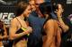 Feb 21, 2014; Las Vegas, NV, USA; UFC Bantamweights Alexis Davis (L) and Jessica Eye (R) face off for photographers during the UFC 170 weigh-ins at Mandalay Bay Events Center. Mandatory Credit: Stephen R. Sylvanie-USA TODAY Sports