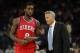 Feb 10, 2014; Oakland, CA, USA; Philadelphia 76ers head coach Brett Brown speaks to shooting guard Tony Wroten (8) between plays against the Golden State Warriors during the fourth quarter at Oracle Arena. The Golden State Warriors defeated the Philadelph