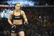 Feb 22, 2014; Las Vegas, NV, USA; Ronda Rousey (red gloves) prior to the start of her fight against Sara McMann (blue gloves) for their UFC bantamweight championship bout at Mandalay Bay. Mandatory Credit: Stephen R. Sylvanie-USA TODAY Sports