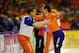 HEERENVEEN, NETHERLANDS - MARCH 24: Bob de Jong (R) of the Netherlands celebrates with his coach Jillert Anema after clocking the fastest time at the 10000m race at the Essent ISU World Single Distances Championship Speed Skating at the Thialf Stadium on