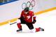 SOCHI, RUSSIA - FEBRUARY 23: Jonathan Toews #16 of Canada celebrates after scoring the opening goal against Henrik Lundqvist #30 of Sweden in the first period during the Men's Ice Hockey Gold Medal match on Day 16 of the 2014 Sochi Winter Olympics at Bol