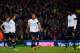NORWICH, ENGLAND - FEBRUARY 23: A dejected Aaron Lennon, Mousa Dembele and Emmanuel Adebayor of Tottenham Hotspur look on during the Barclays Premier League match between Norwich City and Tottenham Hotspur at Carrow Road on February 23, 2014 in Norwich, E