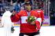 SOCHI, RUSSIA - FEBRUARY 23: Roberto Luongo #1 of Canada celebrates with his gold medal following his team's 3-0 victory during the Men's Ice Hockey Gold Medal match against Sweden on Day 16 of the 2014 Sochi Winter Olympics at Bolshoy Ice Dome on Februar
