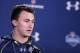 INDIANAPOLIS, IN - FEBRUARY 21: Former Texas A&M quarterback Johnny Manziel speaks to the media during the 2014 NFL Combine at Lucas Oil Stadium on February 21, 2014 in Indianapolis, Indiana. (Photo by Joe Robbins/Getty Images)