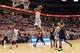 COLUMBUS, OH - FEBRUARY 11: Sam Thompson #12 of the Ohio State Buckeyes finishes off a fast break in the second half against the Michigan Wolverines with a slam dunk on February 11, 2014 at Value City Arena in Columbus, Ohio. Michigan defeated Ohio State