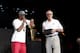 MIAMI, FL - JUNE 25: Dwyane Wade #3 of the Miami Heat speaks on stage as the Miami Heat President Pat Riley looks on during a rally for the 2012 NBA Champions Miami Heat at American Airlines Arena on June 25, 2012 in Miami, Florida. NOTE TO USER: User e