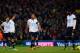 NORWICH, ENGLAND - FEBRUARY 23: A dejected Aaron Lennon, Mousa Dembele and Emmanuel Adebayor of Tottenham Hotspur look on during the Barclays Premier League match between Norwich City and Tottenham Hotspur at Carrow Road on February 23, 2014 in Norwich, E