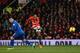 MANCHESTER, ENGLAND - JANUARY 28: Ashley Young of Manchester United scores his team's second goal during the Barclays Premier League match between Manchester United and Cardiff City at Old Trafford on January 28, 2014 in Manchester, England. (Photo by
