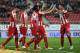 ATHENS,GREECE - FEBRUARY 5: Olympiacos F.C. players celebrate during the Greek Superleague match between Olympiacos F.C. and Panionios GSS at the Karaiskaki Stadium on February 5, 2014 in Piraeus near Athens. (Photo by Milos Bicanski/EuroFootball/Getty