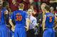 FAYETTEVILLE, AR - JANUARY 11: Head Coach Billy Donovan talks with Jacob Kurtz #30 of the Florida Gators during a timout against the Arkansas Razorbacks at Bud Walton Arena on January 11, 2014 in Fayetteville, Arkansas. The Gators defeated the Razorback