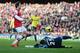 LONDON, ENGLAND - FEBRUARY 22: Tomas Rosicky of Arsenal lifts the ball over Vito Mannone of Sunderland to score a goal during the Barclays Premier League match between Arsenal and Sunderland at Emirates Stadium on February 22, 2014 in London, England. (