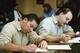 Stant (left) and Derrick Smith signed papers in court in Portland on Jan. 21, 1994.