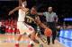 NEW YORK, NY - FEBRUARY 01: Derrick Wilson #12 of the Marquette Golden Eagles drives to the basket against Jamal Branch #0 of the St. John's Red Storm during the game at Madison Square Garden on February 1, 2014 in New York City. (Photo by Nate Shron/Ge
