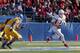 SAN JOSE, CA - NOVEMBER 29: Quarterback Derek Carr #4 of the Fresno State Bulldogs picks up 12 yards and a first down as he holds on to the ball against the San Jose State Spartans in the first quarter on November 29, 2013 at Spartan Stadium in San Jose,