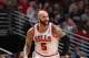 CHICAGO, IL - JANUARY 24: Carlos Boozer #5 of the Chicago Bulls runs down courts during the game against the Los Angeles Clippers on January 24, 2014 at the United Center in Chicago, Illinois. NOTE TO USER: User expressly acknowledges and agrees that, by