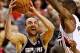 Feb 19, 2014; Portland, OR, USA; San Antonio Spurs shooting guard Manu Ginobili (20) shoots over Portland Trail Blazers power forward Thomas Robinson (41) during the third quarter at the Moda Center. Mandatory Credit: Craig Mitchelldyer-USA TODAY Sports