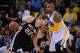 December 19, 2013; Oakland, CA, USA; San Antonio Spurs center Tiago Splitter (22) dribbles against Golden State Warriors power forward Marreese Speights (5) during the first quarter at Oracle Arena. Mandatory Credit: Kyle Terada-USA TODAY Sports